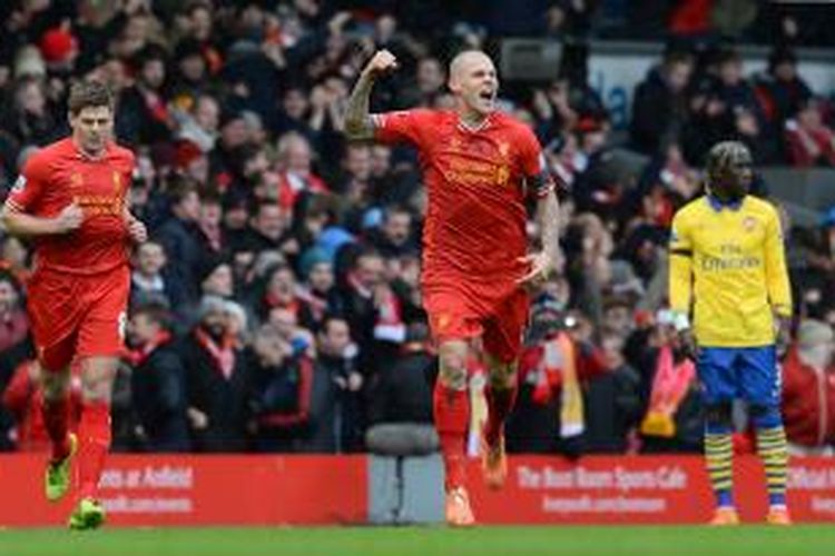 Bek Liverpool, Martin Skrtel, seusai mencetak gol pertama ke gawang Arsenal pada lanjutan Premier League di Stadion Anfield, Sabtu (8/2/2014). 