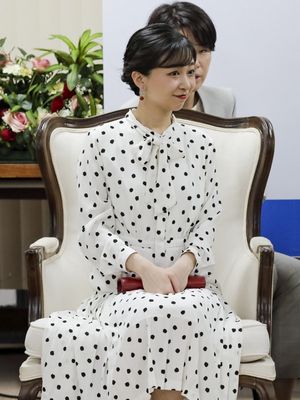 Japan's Princess Kako of Akishino meets with the Rector of the University of Brasilia, Rosangela Reigota Naves (out of frame), and students during a visit to the campus in Brasilia on June 12, 2025. (Photo by Sergio Lima / AFP)