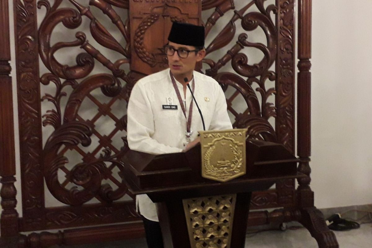Wakil Gubernur DKI Jakarta Sandiaga Uno memberikan keterangan kepada wartawan di Balai Kota, Jakarta Pusat, Jumat (18/5/2018).