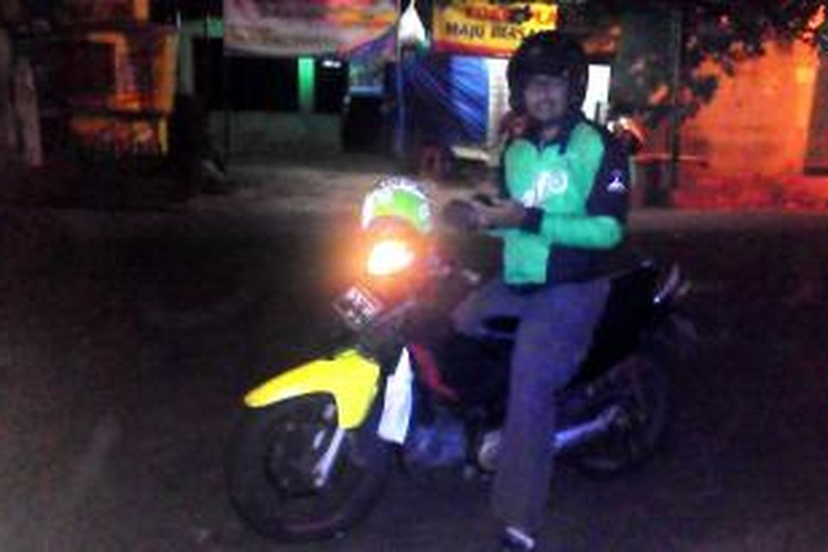 Faridz Budhi Surya Kusuma (33), mantan manajer sebuah resort yang beralih profesi sebagai rider Go-Jek.