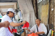 Susuri Kota Ambon, Pj Gubernur Maluku Bagi 6.300 Bendera Merah Putih