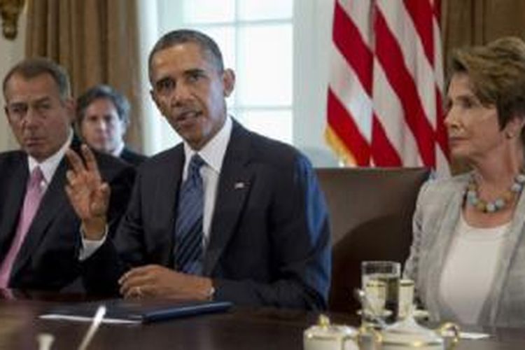 Presiden Obama (tengah) mengadakan pertemuan dengan pimpinan Kongres AS di Gedung Putih terkait rencana serangan militer ke Suriah (3/9).