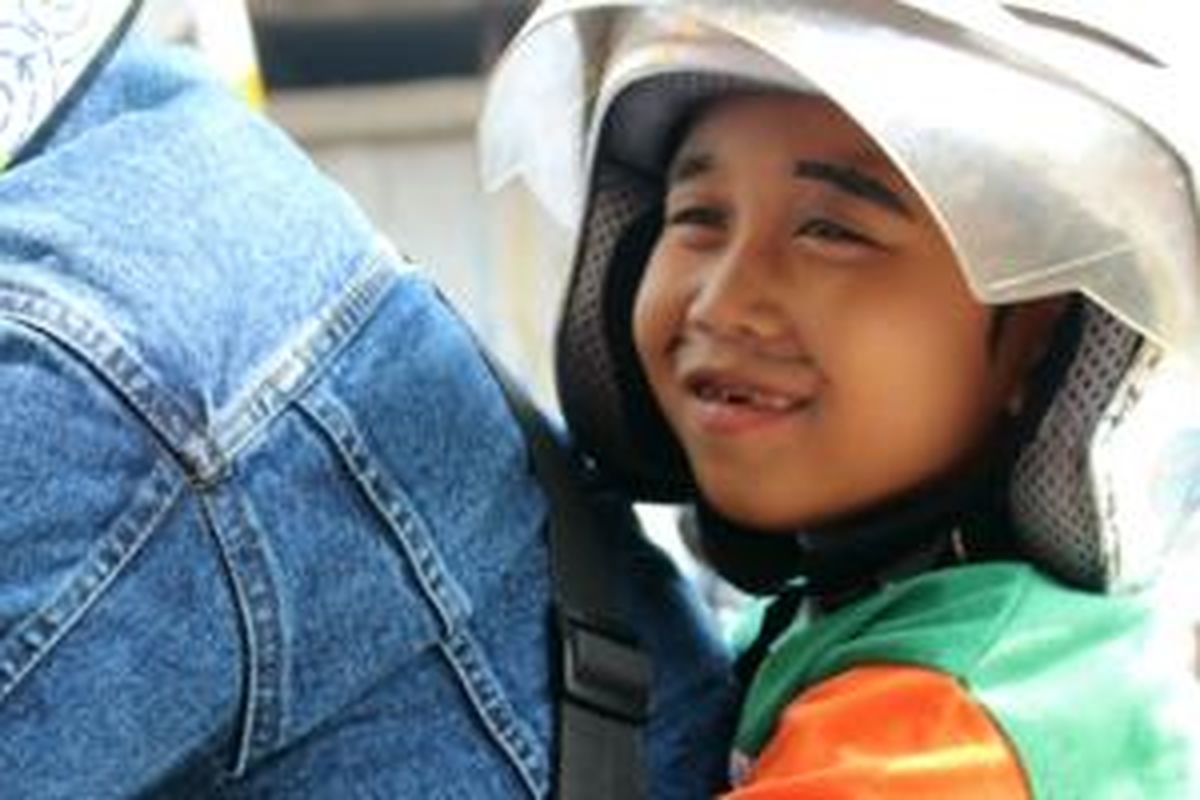 Kegiatan CSR komunitas sepeda motor besar Honda dengan para anak jalanan.