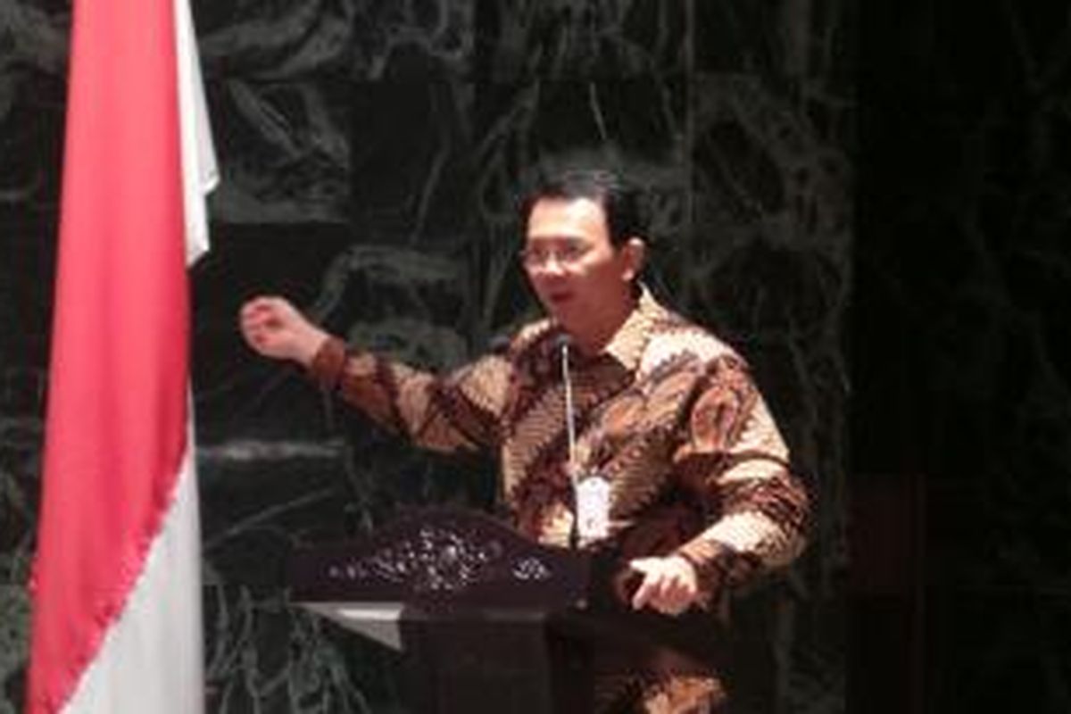 Gubernur DKI Jakarta Basuki Tjahaja Purnama saat menjadi narasumber dalam Talkshow Strategi Tata Kelola Anggaran yang Efektif, di Balaikota, Kamis (11/12/2014).