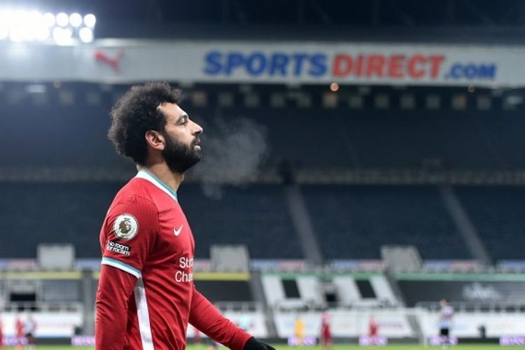 Penyerang Liverpool, Mohamed Salah, bereaksi setelah laga Liga Inggris kontra Newcastle United pada Kamis (31/12/2020) dini hari WIB.