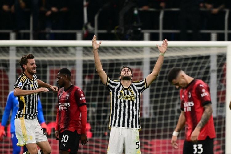 Manuel Locatelli merayakan gol dalam laga pekan kesembilan Liga Italia 2023-2024 antara Milan vs Juventus di Stadion San Siro, 22 Oktober 2023. (Photo by Marco BERTORELLO / AFP)