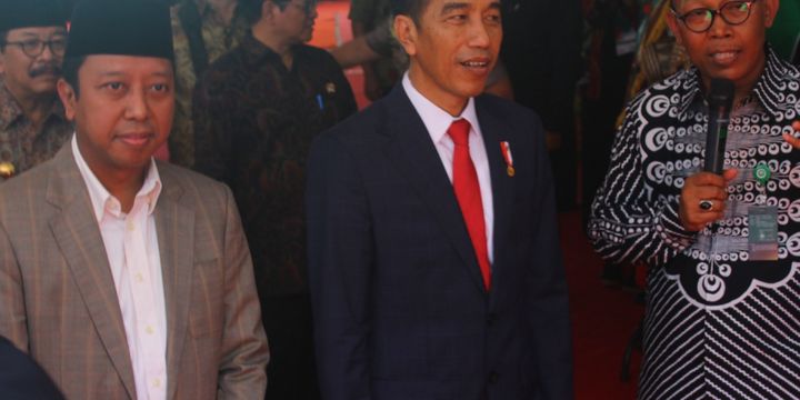 Ketua Umum PPP Muhammad Romahurmuziy saat mendampingi Presiden Joko Widodo di Universitas Islam Malang (Unisma) Kamis (29/3/2018)