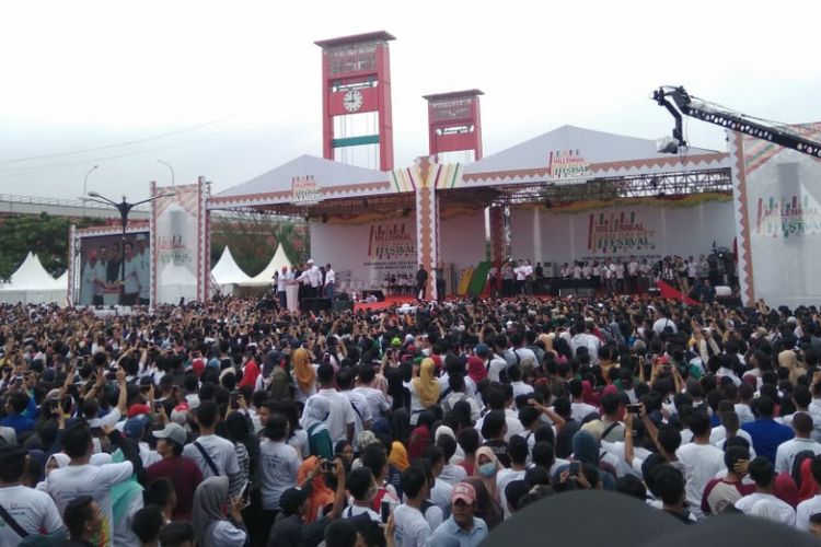 Acara Millenial Road Festival yang dihadiri Presiden Joko Widodo di Palembang, Sumatera Selatan, Sabtu (9/3/2019).