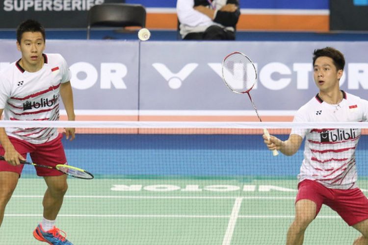 Pasangan ganda putra Indonesia, Marcus Fernaldi Gideon/Kevin Sanjaya Sukamuljo, saat menjalani pertandingan melawan wakil Malaysia, Ong Yew Sin/Teo Ee Yi, pada babak kedua turnamen Korea Terbuka yang berlangsung di SK Handball Stadium, Seoul, Kamis (14/9/2017).