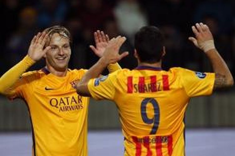 Ivan Rakitic menentukan kemenangan Barcelona atas BATE sekaligus mengantarkan ke puncak klasemen, Selasa (20/10/2015). 