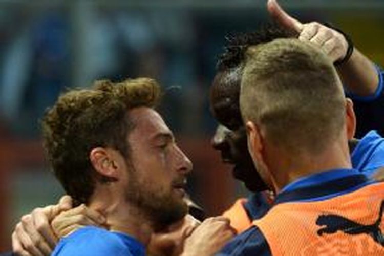 Selebrasi gelandang tim nasional Italia, Claudio Marchisio, seusai membobol gawang Luksemberg, Rabu atau Kamis (5/6/2014) dini hari WIB. 
