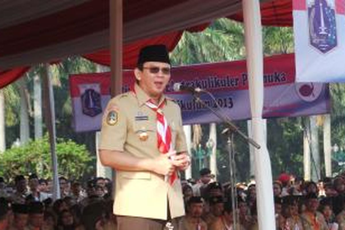 Wakil Gubernur DKI Jakarta Basuki Tjahaja Purnama saat menjadi Inspektur Upacara di Hari Pramuka ke-53, di Lapangan Silang Selatan Monas, Jakarta Pusat, Kamis (14/8/2014).