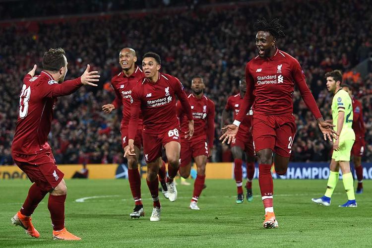 Penyerang Liverpool Divock Origi (kanan) merayakan gol keempat bagi timnya pada leg kedua semifinal Liga Champions melawan Barcelona di Stadion Anfield, Selasa (7/5/2019) atau Rabu dini hari Wib. Liverpool menang besar atas Barcelona dengan skor 4-0 dan membuat 'The Reds' berhak lolos ke final dengan keunggulan agregat 4-3.