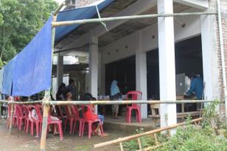 TPS 7 Dusun Kembangkuning, Desa Kembangkuning, Kecamatan Windusari, Kabupaten Magelang, Rabu (9/4/2014).