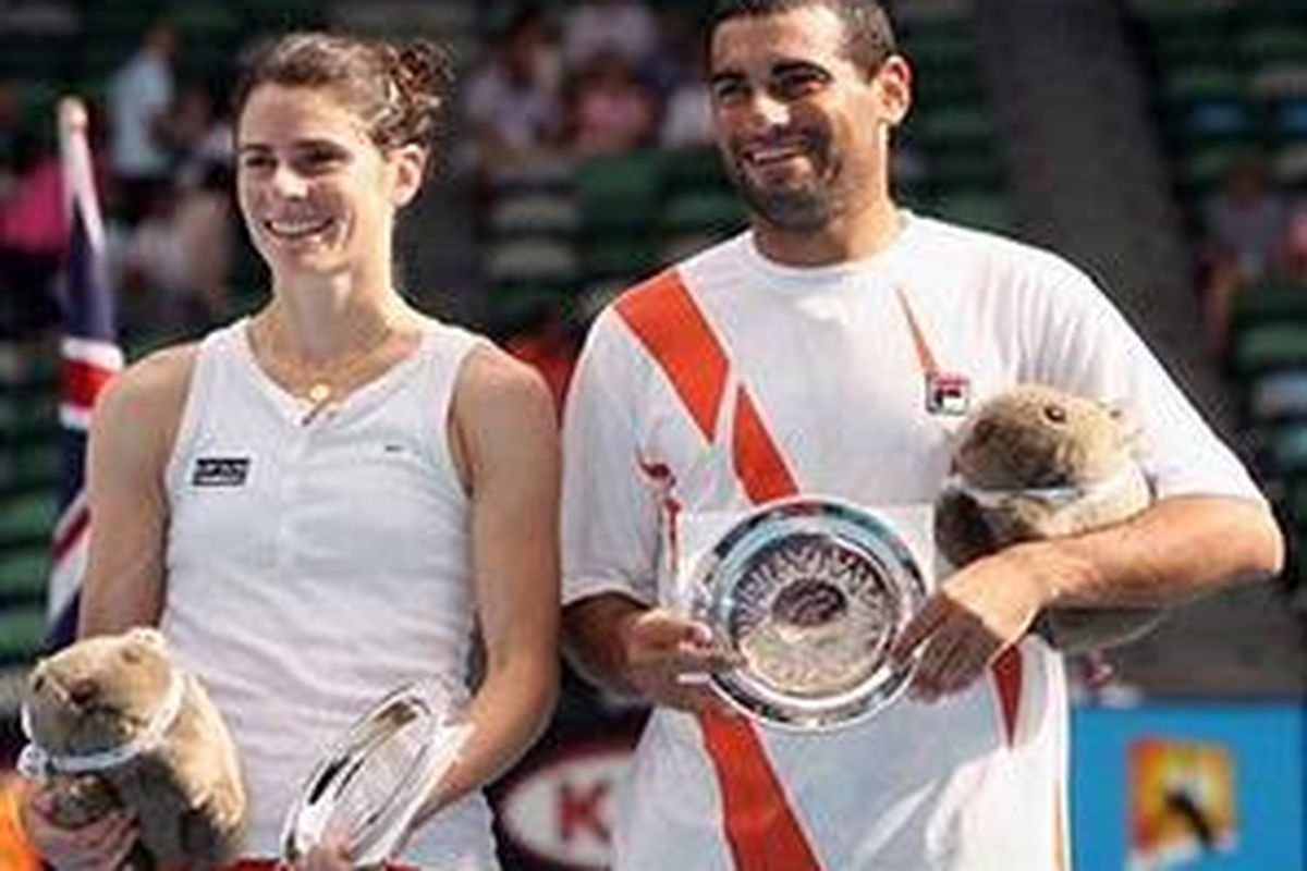 Petenis Israel, Andy Ram (kanan), sudah mendapat visa sehingga bisa tampil di turnamen Dubai pekan depan.