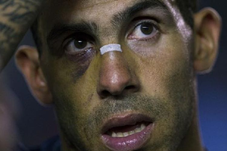 Penyerang Boca Juniors, Carlos Tevez, tampil pada laga kontra Racing Club di Stadion Juan Domingo Peron, pada 18 Oktober 2015.