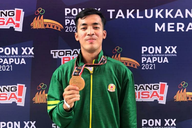 Rahul Faliqul Isbach atlet cabor Taekwondo dengan medali perunggu PON XX Papua.