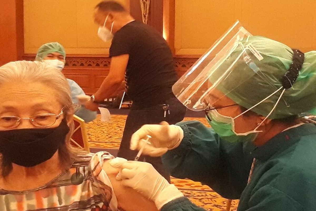 A health care worker is administering Covid-19 vaccine to one of the senior citizens in Bogor, West Java on Saturday, April 24, 2021. 