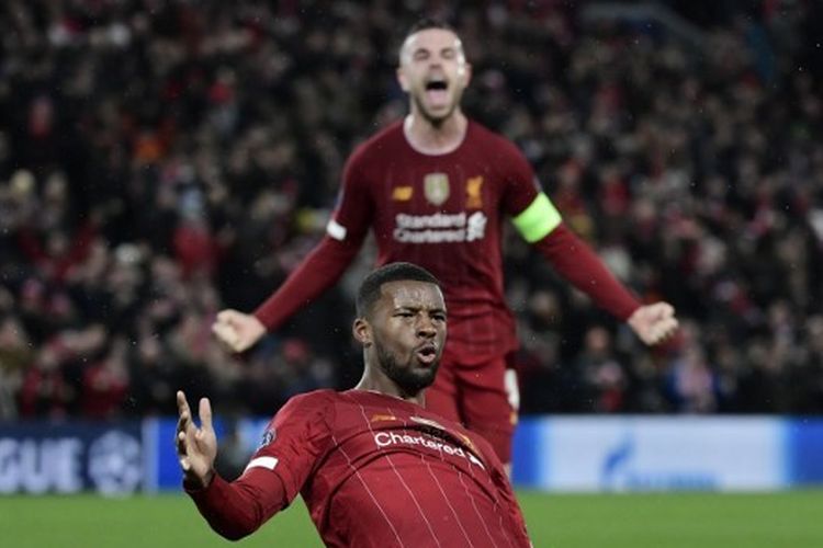 Gelandang Liverpool, Georginio Wijnaldum merayakan golnya ke gawang Ateletico Madrid, Kamis (12/3/2020) dini hari WIB.