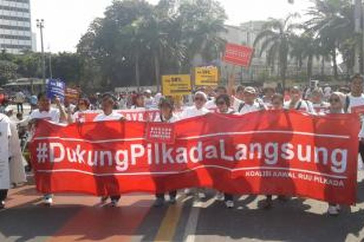 Koalisi Kawal RUU Pilkada kampanyekan pemilihan kepala daerah langsung oleh rakyat, di Bundaran HI, Jakarta Pusat, Minggu (14/9/2014).