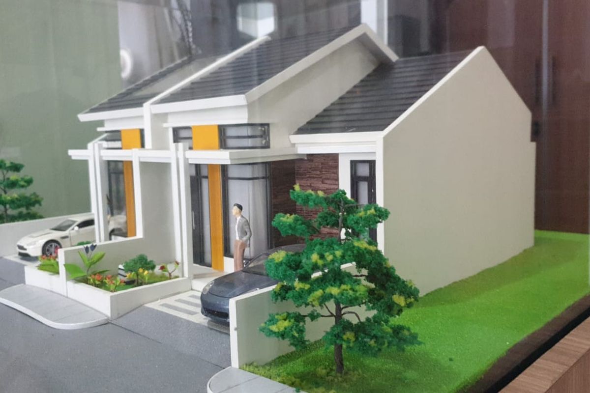 Ilustrasi miniatur rumah.