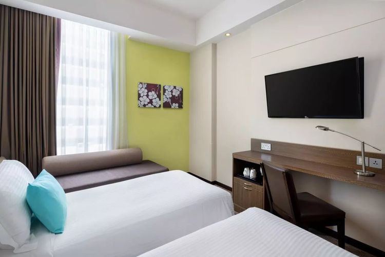 Ilustrasi salah satu kamar Hotel Traveltine yang berlokasi dekat dengan venue konser Coldplay di Singapura.