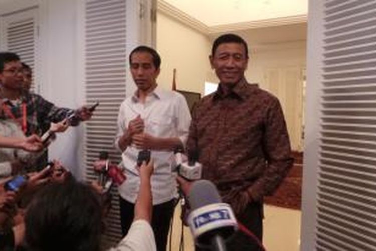 Presiden terpilih Joko Widodo dan Ketua Umum Hanura Wiranto di kantor transisi di Menteng, Jakarta Pusat. Kamis (11/9/2014).