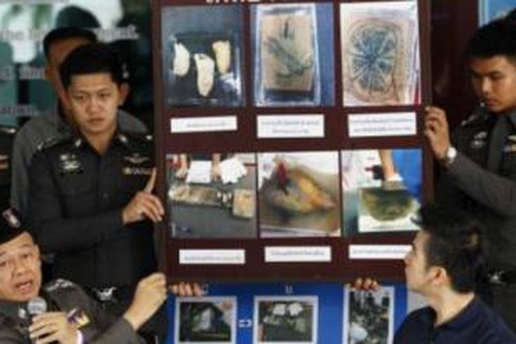 Polisi Thailand menunjukkan foto-foto bagian tubuh yang hendak diselundupkan keluar, Senin (17/11/2014).