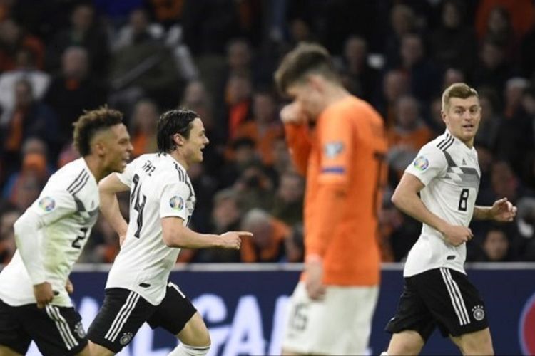 Nico Schulz merayakan golnya pada pertandingan Belanda vs Jerman di Johan Cruyff Arena pada babak kualifikasi Piala Eropa 2020, 24 Maret 2019. 