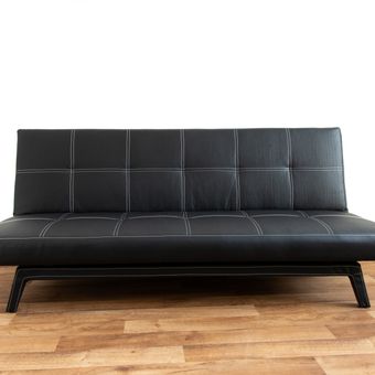 Ilustrasi sofa bed berbahan kulit.