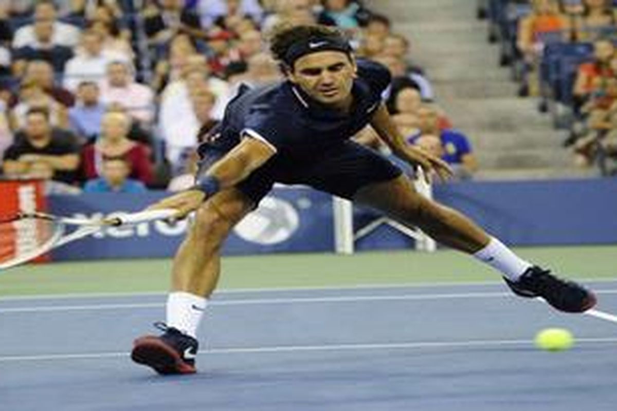 Roger Federer menyingkirkan petenis Jerman, Bjorn Phau di babak kedua AS Terbuka, Kamis (Jumat WIB).