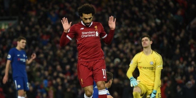 Aksi pemain Liverpool, Mohamed Salah, setelah mencetak gol ke gawang Chelsea dalam laga lanjutan Liga Inggris di Stadion Anfield, Minggu (26/11/2017) dini hari WIB.