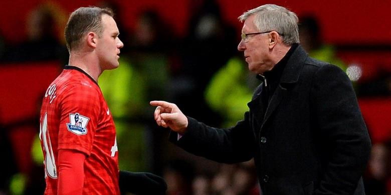 Penyerang Manchester United, Wayne Rooney (kiri), dan manajer Alex Ferguson.