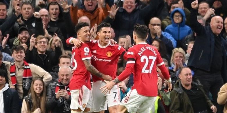 Penyerang Man United Cristiano Ronaldo merayakan gol ke gawang Tottenham Hotspur dalam lanjutan Liga Inggris musim 2021-2022 di Stadion Old Trafford, Minggu (13/3/2022) dini hari WIB.