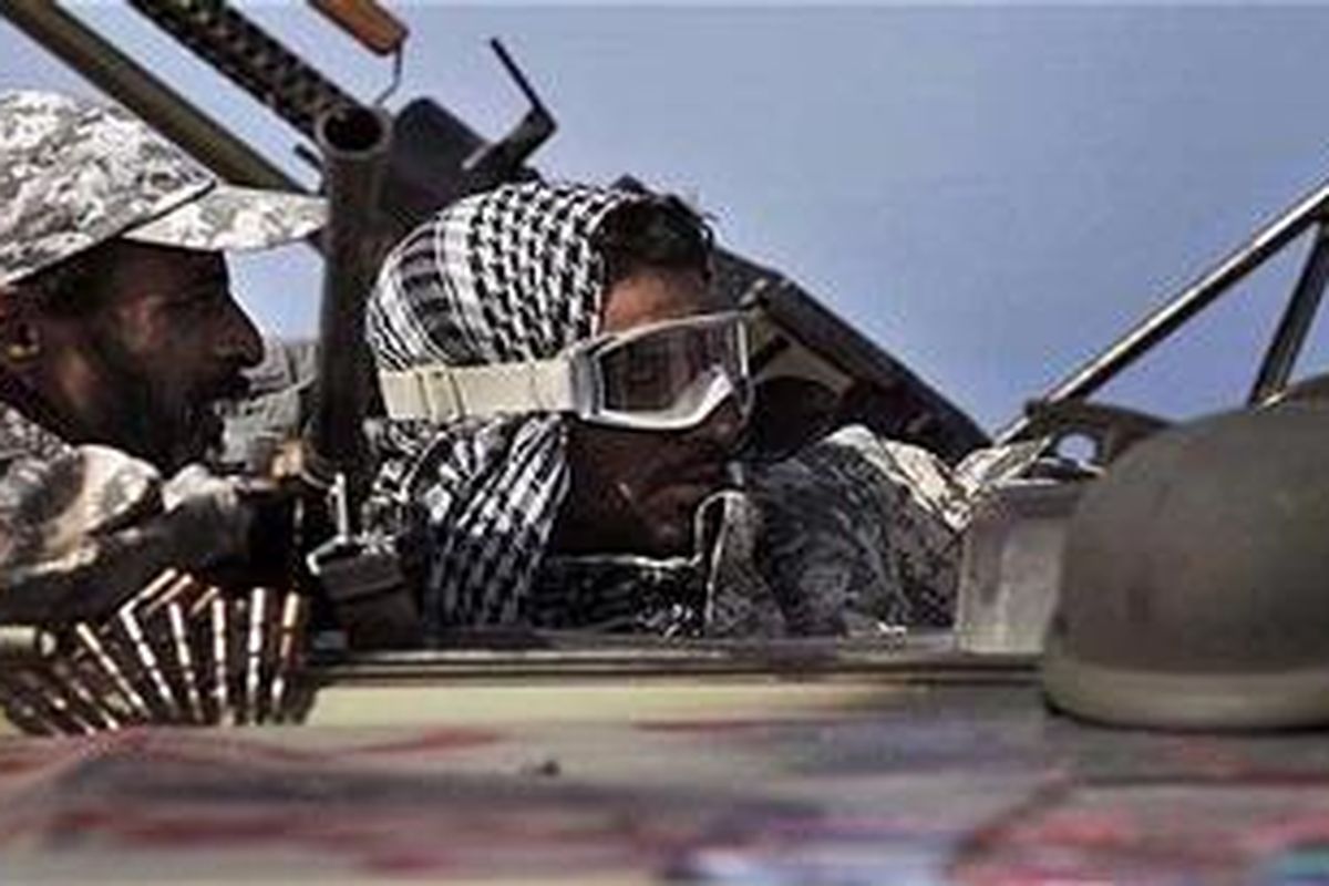 Pasukan anti-pemerintah Libya di pinggiran Bin Jawad, Minggu (27/3/2011), terus bergerak ke arah barat menuju kampung halaman Khadafy, Sirte.