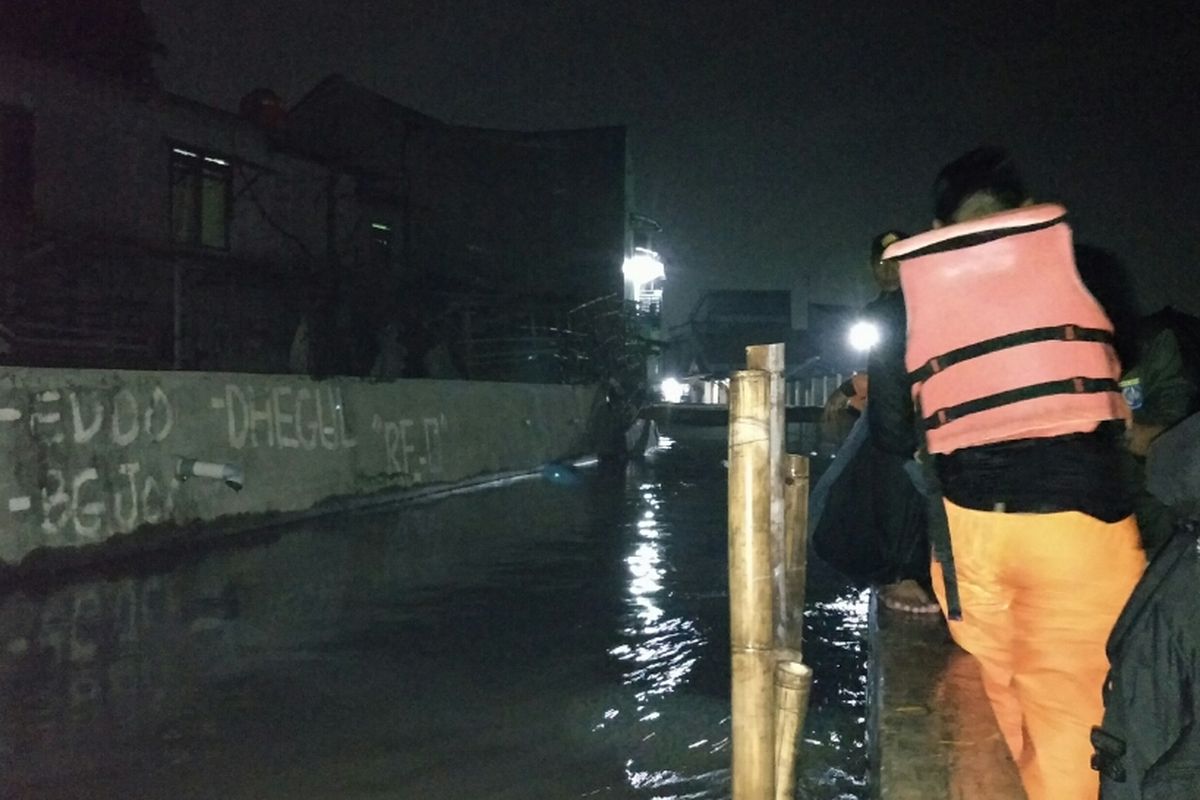 Banjir di Jalan Haji Icang, Tugu, Cimanggis, Depok,Selasa (2/4/2019).