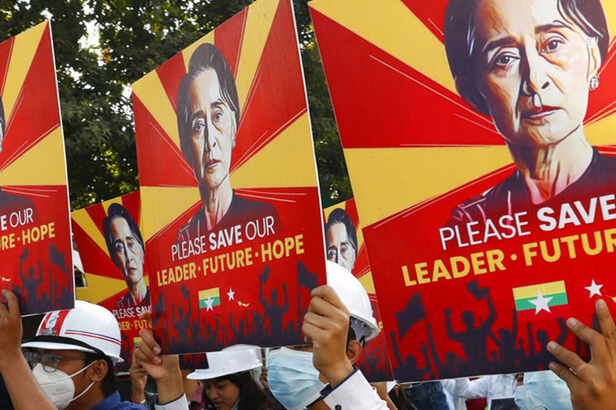 Engineers hold posters with an image of deposed Myanmar leader Aung San Suu Kyi as they hold an anti-coup protest march in Mandalay, Myanmar Monday, February 15, 2021. Myanmar's military leaders extended their detention of Suu Kyi, whose remand was set to expire on Monday, as protests continued to roil the Southeast Asian country following a military coup earlier this month. (AP Photo)