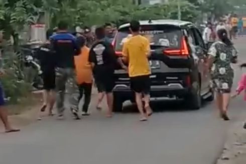 Pengendara Xpander Sebar Uang ke Jalan untuk Konten, Polisi: Kami Minta Metode Pembagian Dipikirkan Ulang