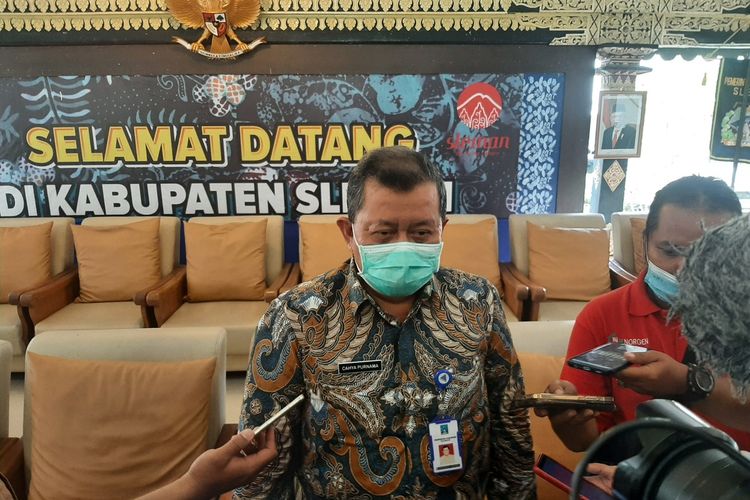 Kepala Dinas Kesehatan Kabupaten Sleman Cahya Purnama saat menemui wartawan usai jumpa pers, Jumat (21/10/2022).