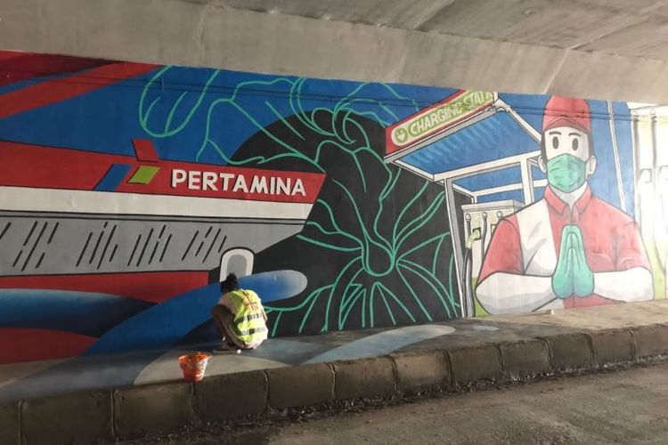Salah satu sisi terowongan yang digarap oleh komunitas grafiti asal Tanah Air
