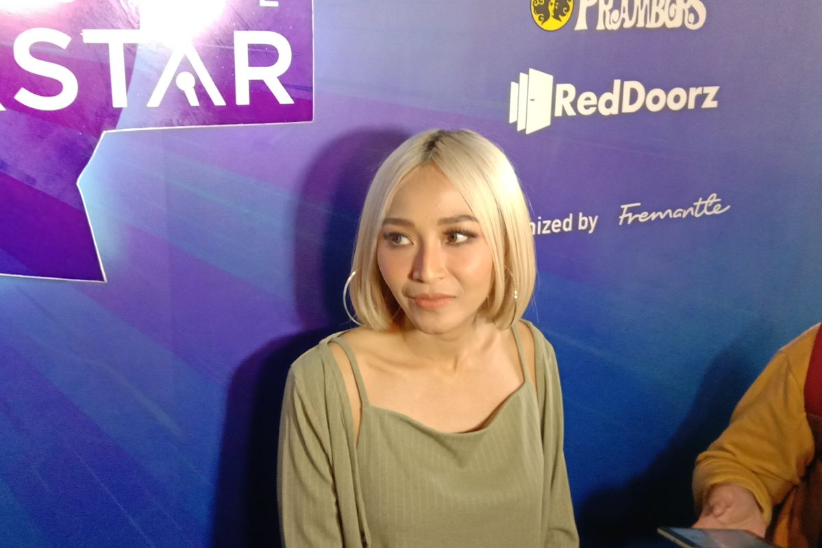 Rinni Wulandari menghadiri acara Joox Karaoke Superstar Vol 2 di Grand Indonesia, Thamrin, Jakarta Pusat, Selasa (6/8/2019).