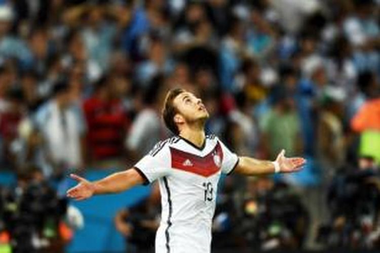 Ekspresi Mario Goetze usai menyarangkan bola ke gawang Argentina pada final Piala Dunia 2014 antara Jerman vs Argentina di Stadion Maracana, Rio de Janeiro, Minggu (13/7/2014) atau Senin dini hari WIB. Satu-satunya gol itu menjadi penentu kemenangan Jerman sekaligus juara Piala Dunia 2014.