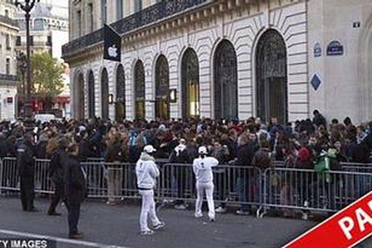 A huge crowd awaited the arrival of the cult phone at the Apple Store in Paris this morning  