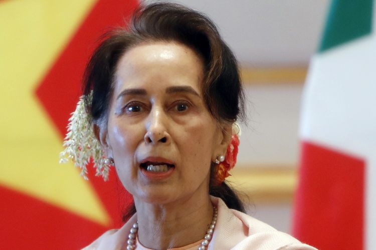FILE - In this Dec. 17, 2019, file photo, Myanmar's leader Aung San Suu Kyi speaks during a joint press conference with Vietnam's Prime Minister Nguyen Xuan Phuc after their meeting at the Presidential Palace in Naypyitaw, Myanmar. Reports says Monday, February 1, 2021 a military coup has taken place in Myanmar and Suu Kyi has been detained under house arrest. (AP Photo/Aung Shine Oo, File)