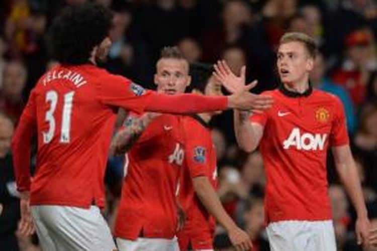 Striker Manchester United, James Wilson, menjalani debut gemilang dengan mencetak dua gol ke gawang Hull City pada laga Premier League di Stadion Old Trafford, Manchester, Selasa (6/5/2014).