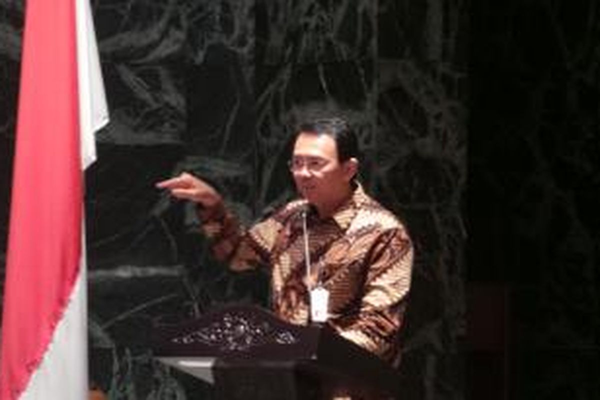 Gubernur DKI Jakarta Basuki Tjahaja Purnama saat menjadi narasumber dalam Talkshow Strategi Tata Kelola Anggaran yang Efektif, di Balaikota, Kamis (11/12/2014).