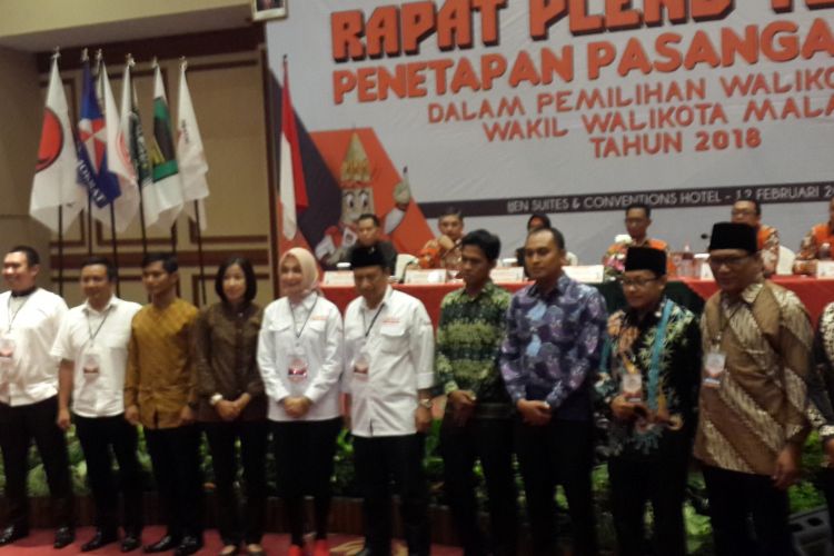 Tiga pasangan calon Pilkada Kota Malang bersama sejumlah pengawal pribadi dari personel kepolisian, Senin (12/2/2018).