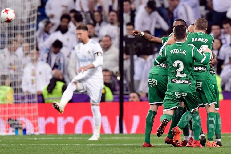 Para pemain Leganes merayakan gol yang dicetak ke gawang Real Madrid dalam laga leg kedua perempat final Copa del Rey di Stadion Santiago Bernabeu, Madrid, Spanyol, pada 24 Januari 2018.