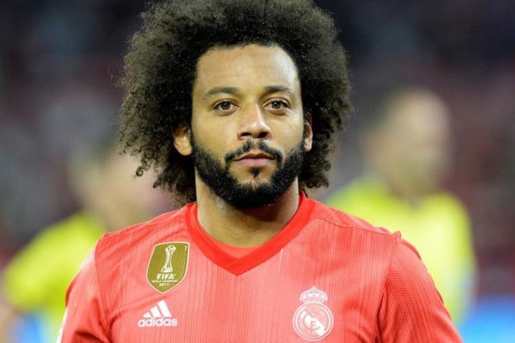 Bek sayap Real Madrid, Marcelo, beraksi dalam partai Liga Spanyol melawan Sevilla di Stadion Ramon Sanchez Pizjuan, Sevilla, 26 September 2018.
