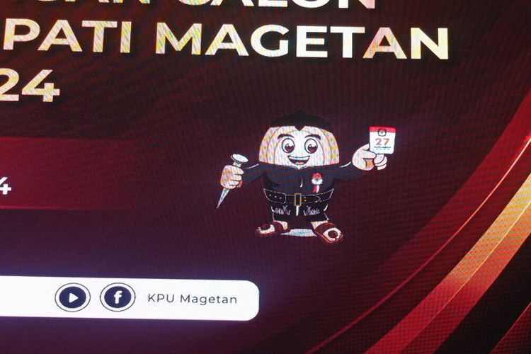 Logo KPU Magetan Si Bolih tiba-tiba berubah dari setelan baju bermotif bambu sedapur menjadi kaos warna hitam polos. 